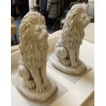 PAIR OF MEDUIM SEATED LIONS