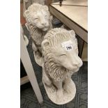 PAIR OF SMALL SEATED LIONS