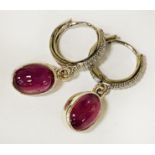 PAIR OF CABACHON RUBY LEVER BACK EARRINGS