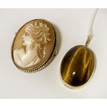 CAMEO BROOCH AND TIGERS EYE PENDANT WITH 9CTY GOLD