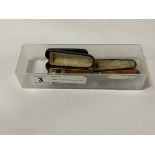 THREE CIGARETTE HOLDERS INCL. 1 9CT & 1 SILVER IN CASES