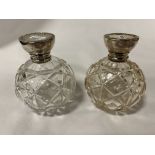 TWO GLASS STERLING SILVER TOPPED SCENT BOTTLES