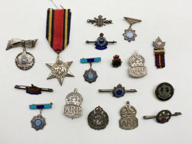 SELECTION OF VARIOUS MILITARY-RELATED BROOCHES AND BADGES INCLUDING A BURMA STAR MEDAL
