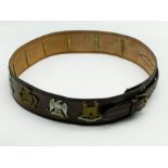 VINTAGE LEATHER BELT WITH MILITARY CAP BADGES