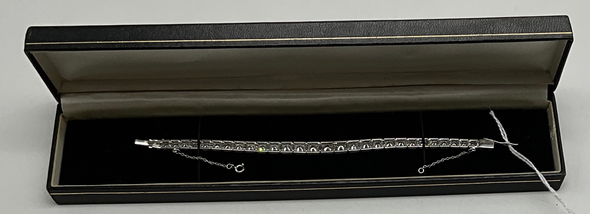 18-CARAT GOLD TENNIS BRACELET WITH THIRTY-ONE GRADUATING TRANSITIONAL BRILLIANT CUT DIAMONDS - Image 3 of 3