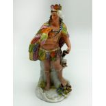 A STAFFORDSHIRE CERAMIC "CONTINENTS" FIGURE HERE REPRESENTED AS AN INDIGENOUS INDIAN CHIEFTAIN.