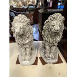 PAIR OF SMALL SEATED LIONS