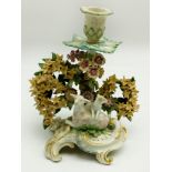 AN EIGHTEENTH-CENTURY ENGLISH PORCELAIN CANDLESTICK WITH FINELY EXECUTED BOCAGE
