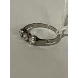 18CT GOLD THREE STONE DIAMOND RING - APPROX 0.30 POINTS EACH STONE - SIZE R