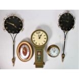 A collection of various clock cases and movements