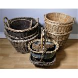 A collection of eleven various sized wicker baskets. (11)