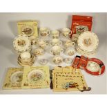 A collection of Royal Doulton Bunnykins ceramics to include, two boxed wall clocks, egg cup and