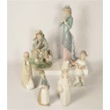 Six Lladro figurines to include, Lady reading a book 34cm, Girl with doll type 315 23cm, Madonna