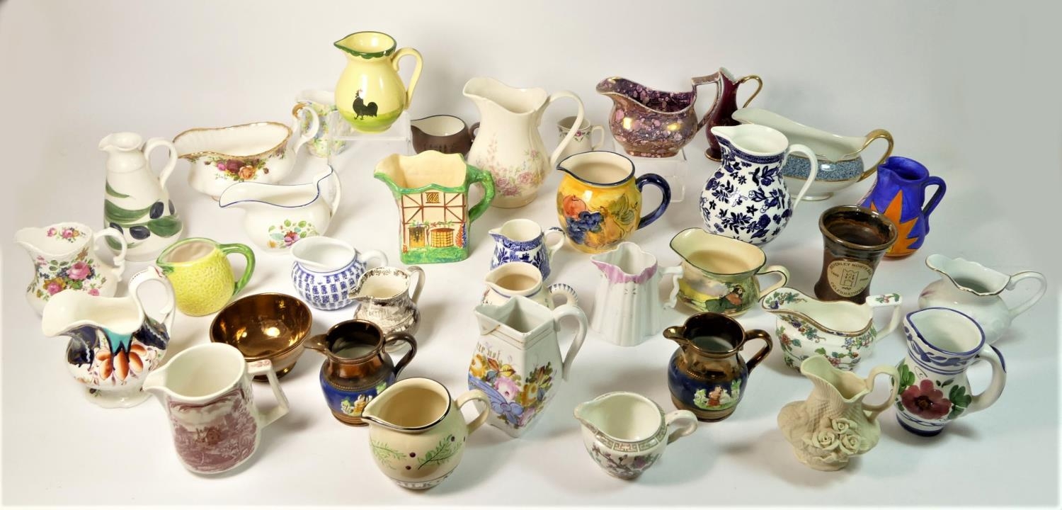 A collection of mid 20th Century and later ceramic jugs makers to include, Royal Albert, Royal