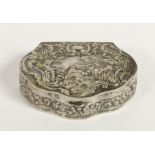 A German silver cartouche shape snuff box, bearing Hanau pseudo marks, with embossed decoration, 6.5