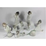 A collection of 8 Lladro figurines to include, Mime Angel 23cm, Curious Angel 24cm, Angel