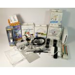 A Nintendo Wii games console, complete with fourteen games, hand controllers, Wii Wheels, Samba De