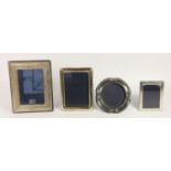 A silver photograph frame, London 1992, 18 x 14cm and three other silver frames