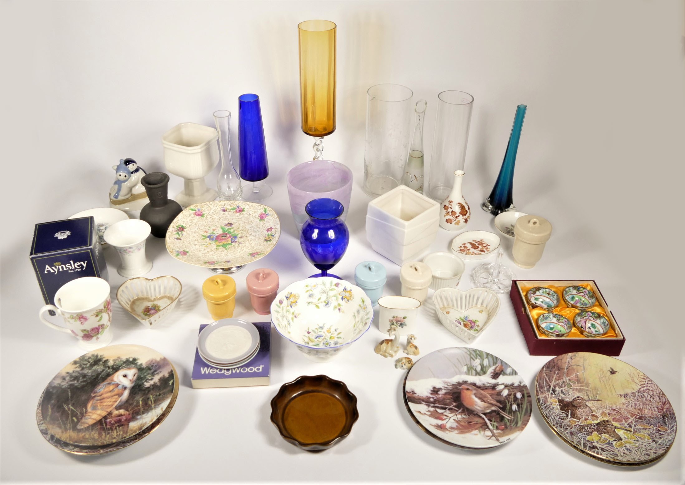 A collection of ceramics and glassware to include, Wedgewood vases, a Minton 'Haddon Hall' bowl,