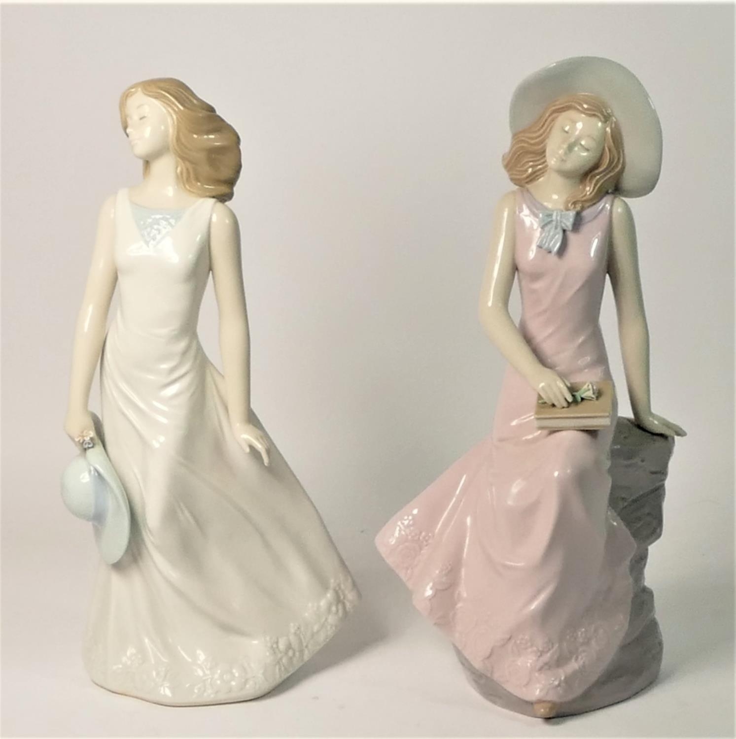 A pair of Spanish ceramic figurines by Nadel. 36cm tall. (2)