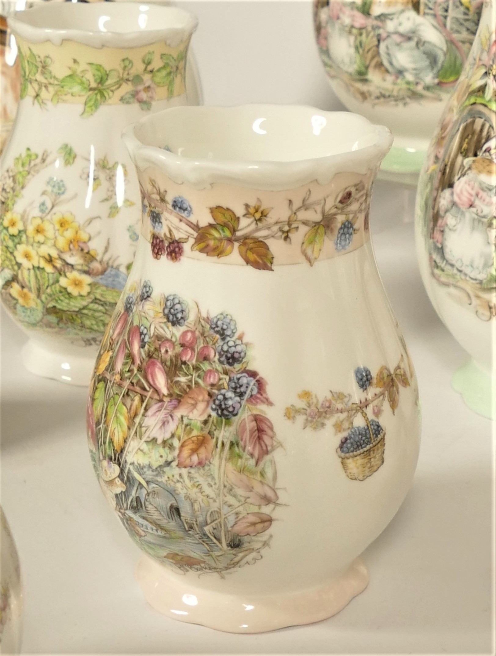 A collection of Royal Doulton Brambly Hedge ceramics to include, flower vases, picture frames, - Image 3 of 3