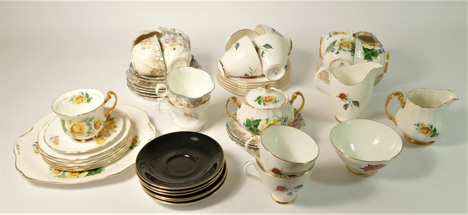 A mid 20th Century bone china tea service by Devonia, together with a collection of cups & saucers - Image 4 of 4