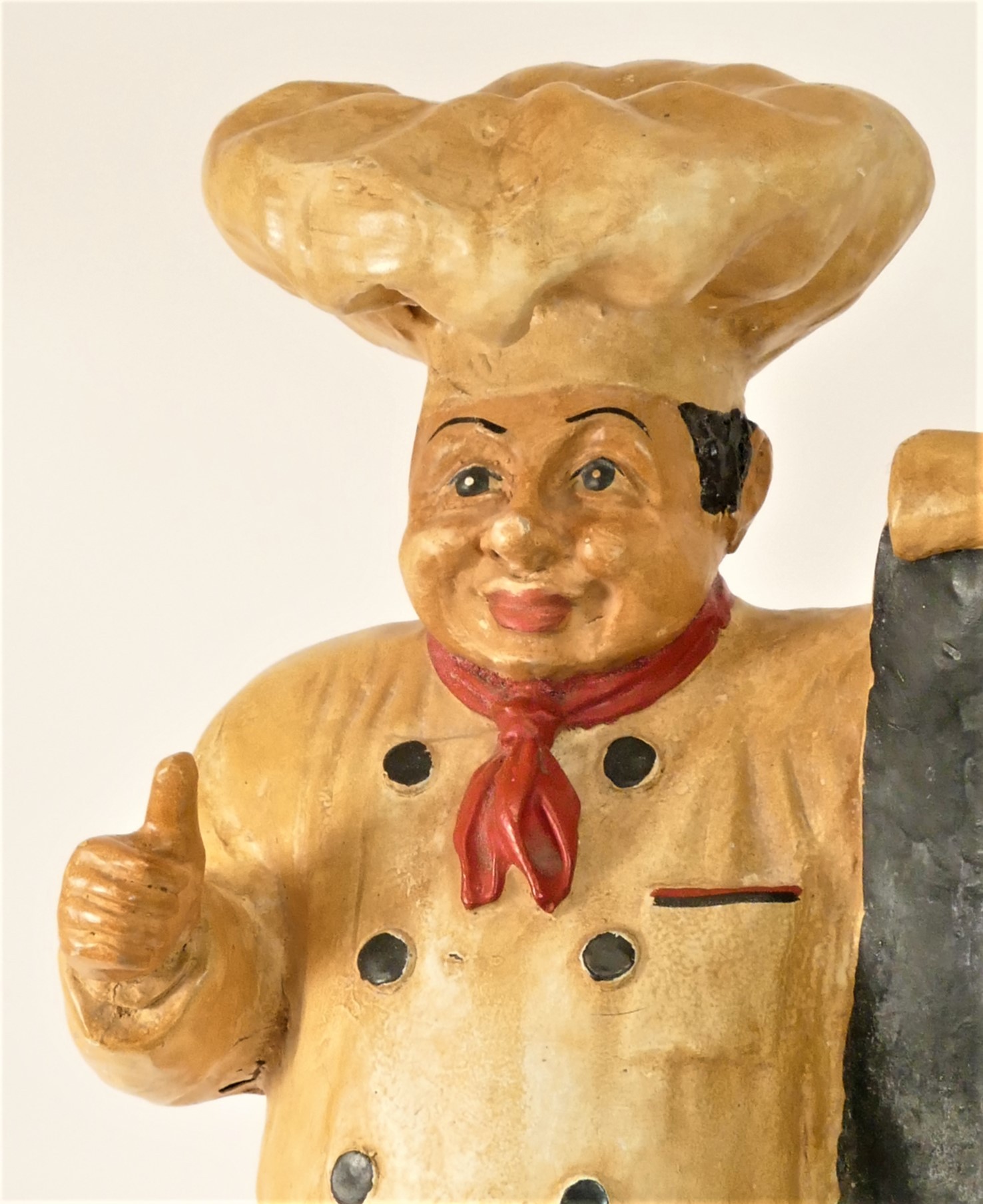 A resin statue of a baker holding a menu board, 49cm tall. - Image 2 of 2