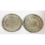 A pair of unmarked silver Asian embossed pin dishes, 10cm, 83 gm
