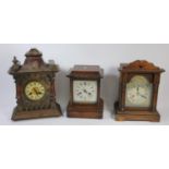 A collection of clocks to include, oak cased mantle clocks and other mantle clocks (2)