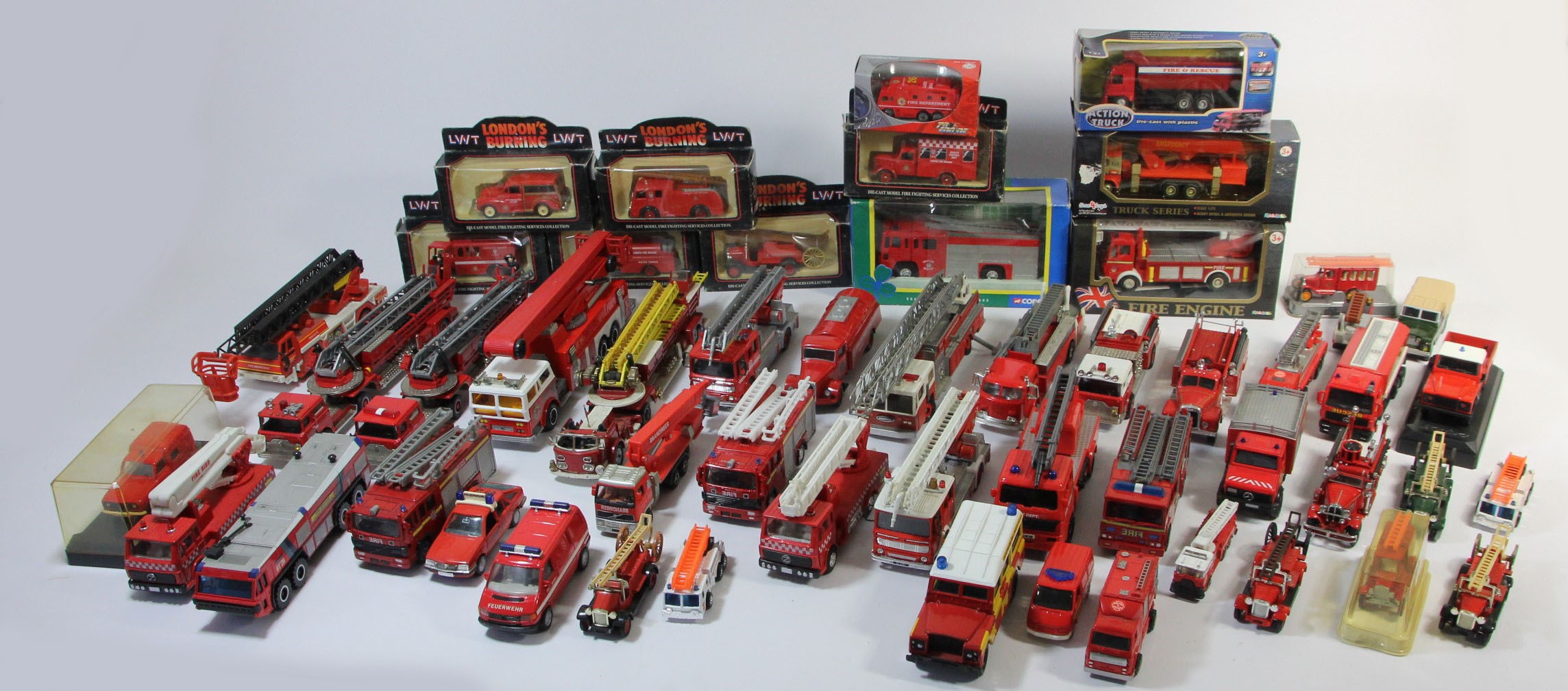 A large collection of primarily fire fighting related diecast model vehicles, makers to include -