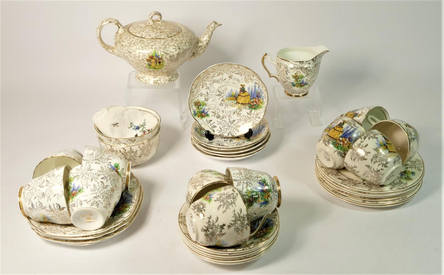 A mid 20th Century bone china tea service by Devonia, together with a collection of cups & saucers - Image 2 of 4