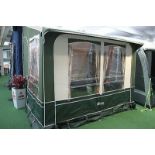 A Inaca Kalahari caravan porch/awning, green fabric, with aluminium poles & fittings (only used 3