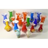 A collection of handblown Chinese art glass vases.
