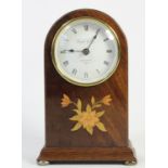 A Knights & Gibbins, London, a mahogany mantle clock, the white enamel dial with Roman numerals