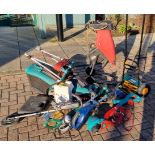 A Champion 2400W garden shreader PDCGS2400F, a Bosch Rotak 36 Ergoflex lawnmower and a quantity of