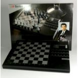 A Kasparov Team-Mate Advanced Trainer, made by Saitek in box with manual, including a full set of