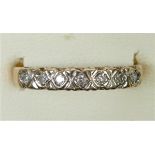 A 9ct gold and diamond half eternity ring, size P, 1.8gm