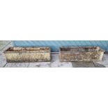 A pair of reconstituted stone rectangular garden planters, 92 x 27 x 26cm