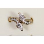 A 9ct gold and CZ crossover ring, N, 3.2gm