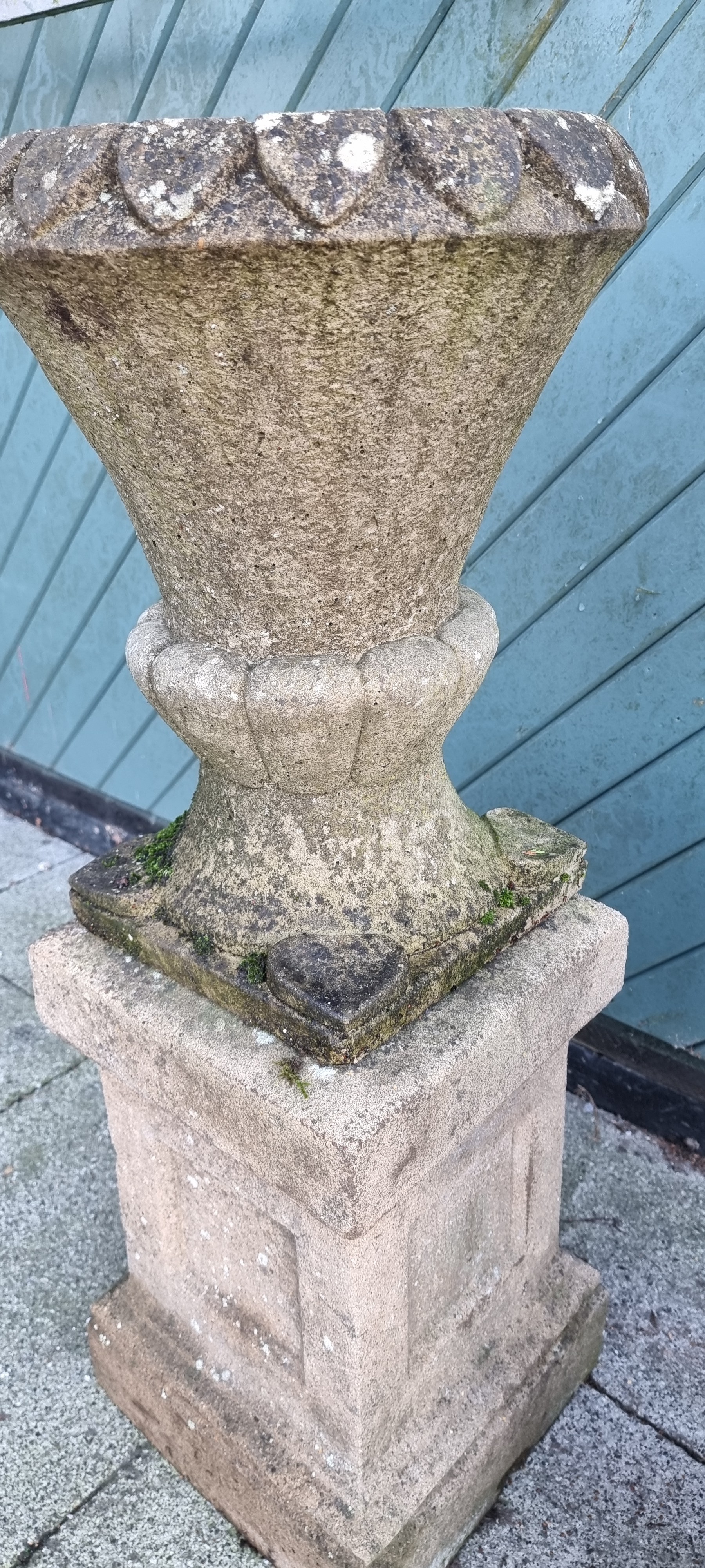 A pair of reconstituted stone garden urns, raised on square plinths, 96cm - Image 2 of 2