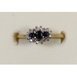 A 9ct gold sapphire and diamond cluster ring, O, 1.8gm