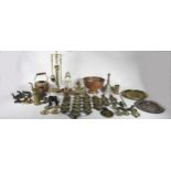 A collection of brass and copper wares, to include horse brasses, candle sticks, bell weights,