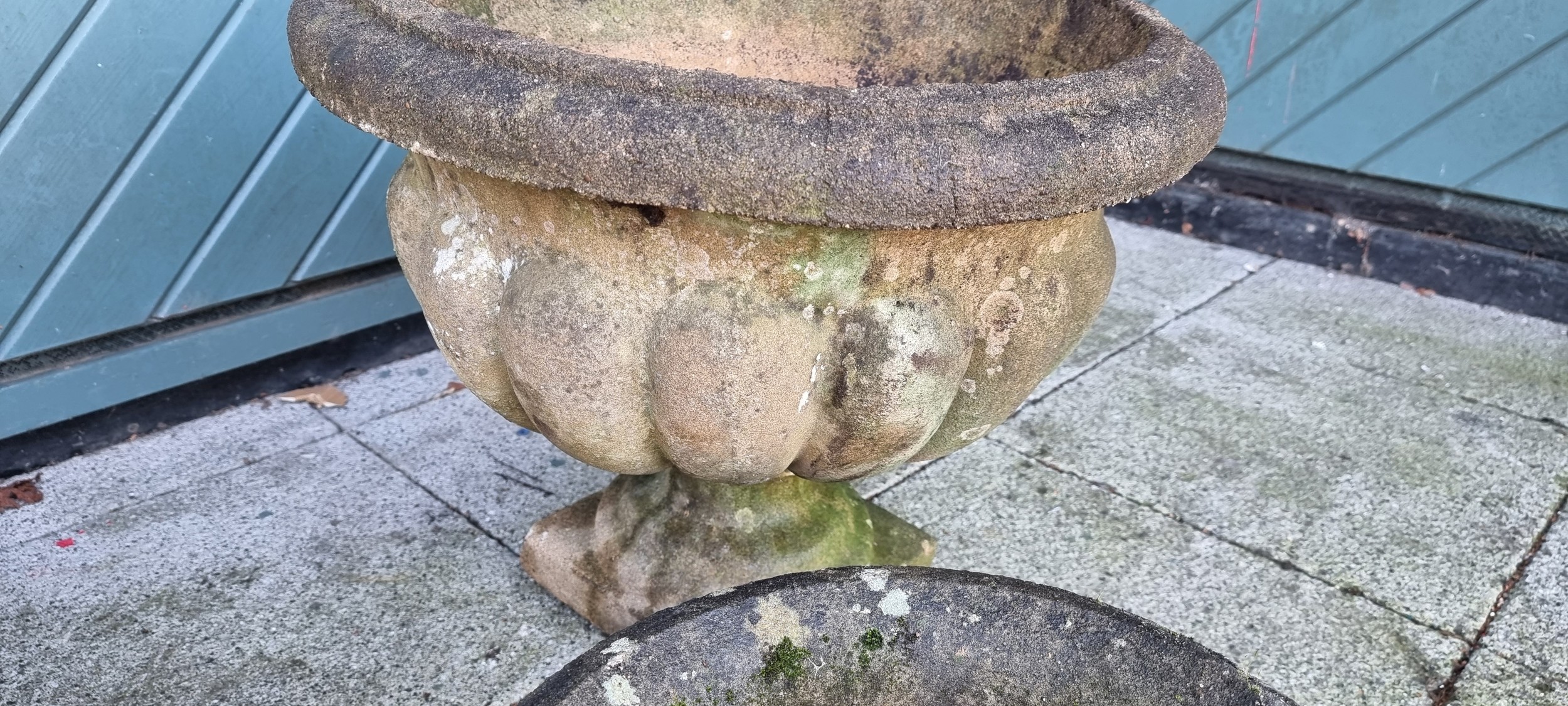 A concrete planter with floral decoration, diameter 46cm and a fluted example, diameter 54cm, - Image 3 of 3