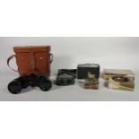 A pair of cased Burleigh field binoculars 10x50, together with an Agfa Pronto folding camera, a