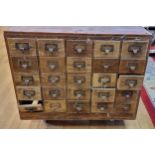A vintage Industrial 25 drawer slightly sloping filing cabinet, one drawer lacking internals, 82 x