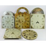 A collection of antique longcase parts, to include five hand painted dials and various movements.