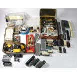 A collection of model railway parts to include, cables, movements, switches, tender and others.