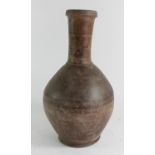 A hand thrown terracotta baluster flask, 37cm