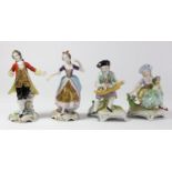 Four 19th century continental porcelain figurines to include, two Sitzendorf figures depicting a