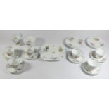 A Shelley, England, Wild Flowers pattern 13668 six piece tea service to include, teacups 7x8cm,